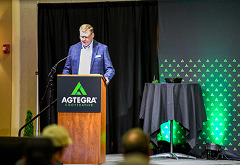 Agtegra Board President Rick Osterday speaks to the members at the annual member meeting.