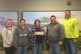 Agtegra team members present check to Ipswich Fire Department