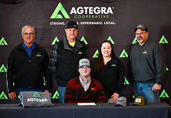Aidan signs Build Dakota Scholarship Contract