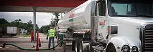 Fuel truck filling at bulk plant