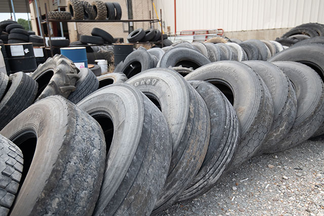 Rows of tires in front of the Co-op.