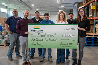 Keystone Team presenting $2,000 check to Shared Harvest Food Bank
