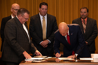 Gov. Ricketts signing coop month proclamation