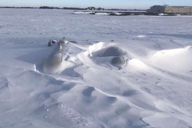 Snow covered propane tank