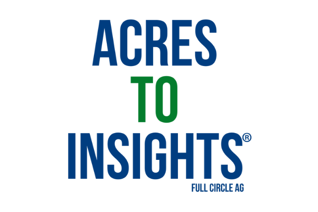 event center meeting with a room full of people sitting at tables listening to a speaker