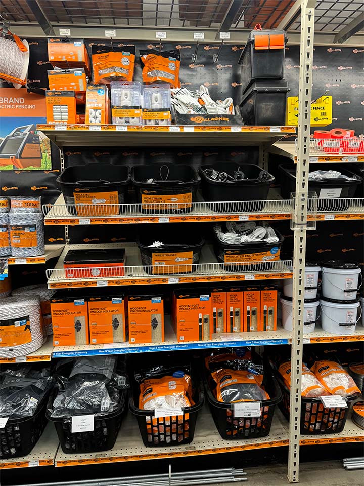 A shelf display of Gallagher fencing products.