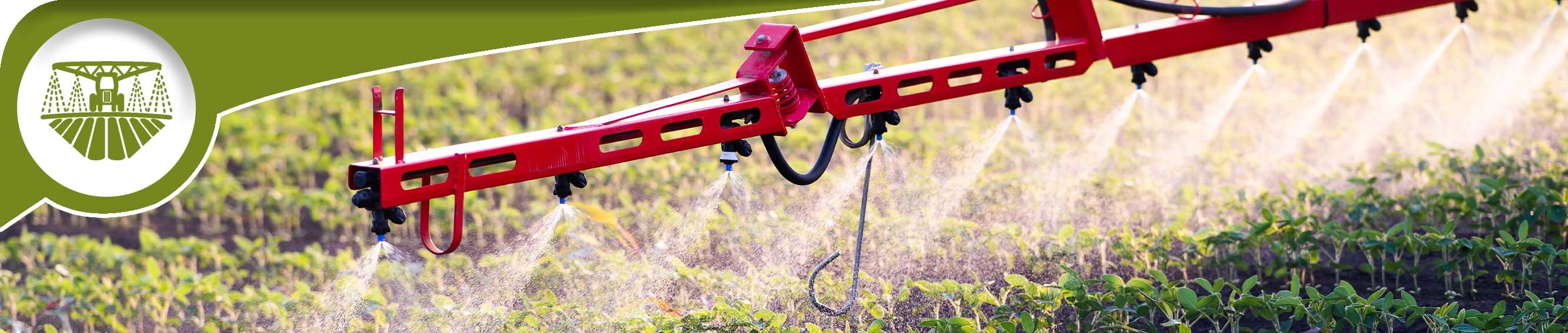 Sprayer Distributing Liquid On Top of Crops in a Field