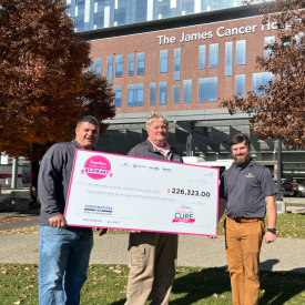 Heritage Cooperative employees celebrate Fueling the Cure reaching over $2 million in funding
