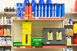 Auto section shelf lined with products.