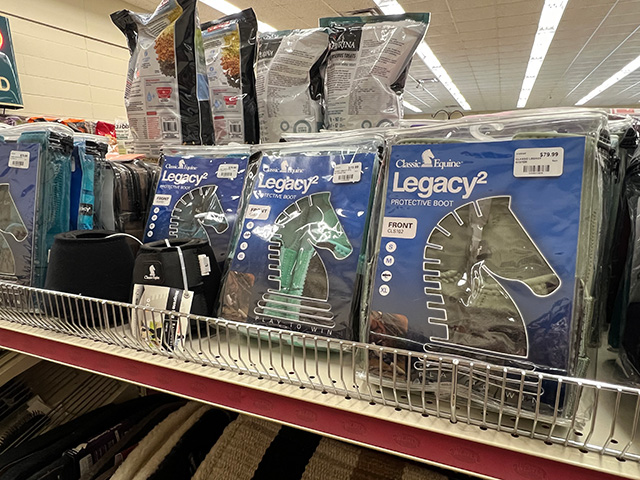 Classic Equine boots on a shelf.