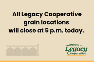 Sign with text stating "Due to wet conditions, all Legacy Cooperative grain locations will close at 5 p.m. today.