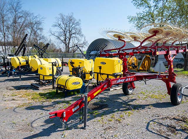 Hay rake and sprayers.