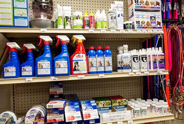 Shelves filled with animal health supplies.