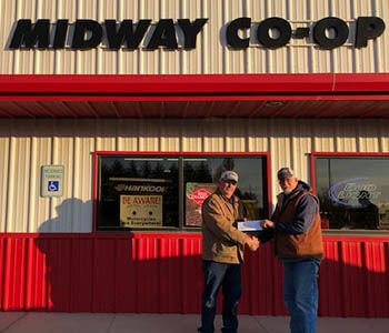 Caven Portenier (Midway Coop Luray Station Manager) and Bill Kennedy (Luray Fire Department Chief) receive support from Midway Coop