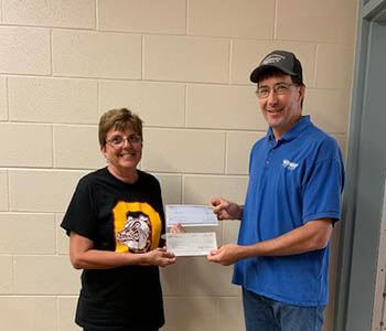  Linda Ubelaker (Osborne County Fair) and Dean Heise (Midway Coop Feed Manager)
