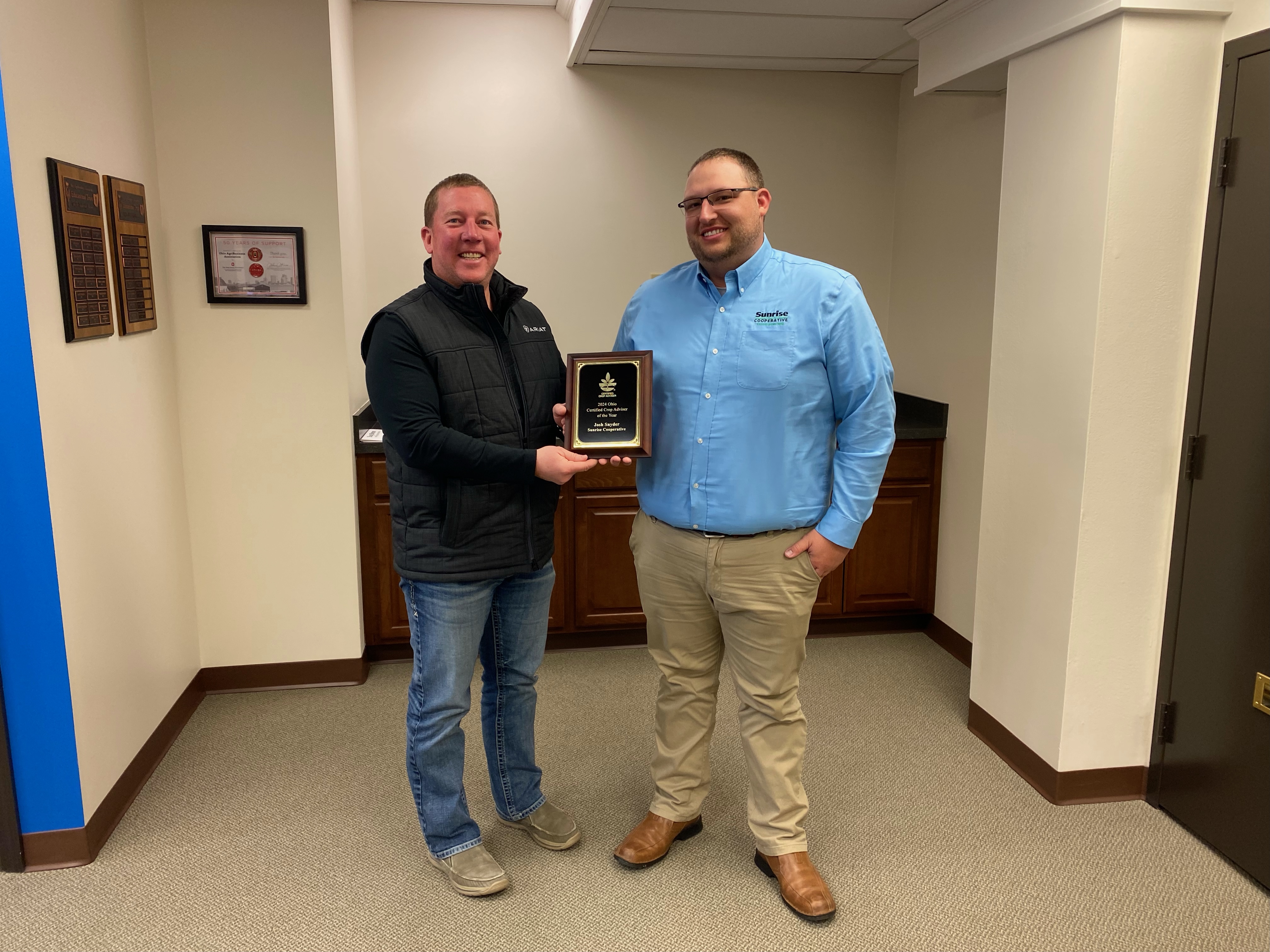 Kevin Otte, Chairman of the CCA Board presenting Josh Snyder, Sunrise Cooperative Precision Agronomy Solutions Advisor the 2024 Ohio CCA of the Year Award