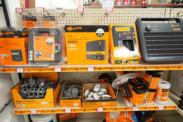 Shelves of various fencing equipment and accessories.