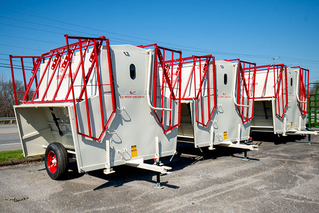 Three Apache Creep Feeders lined up.