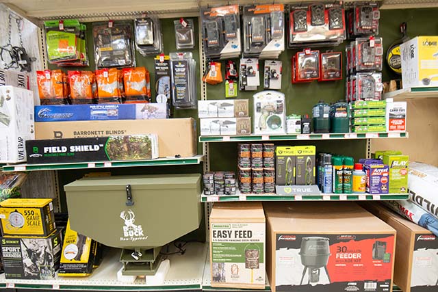 Shelves filled with hunting supplies, and accessories.