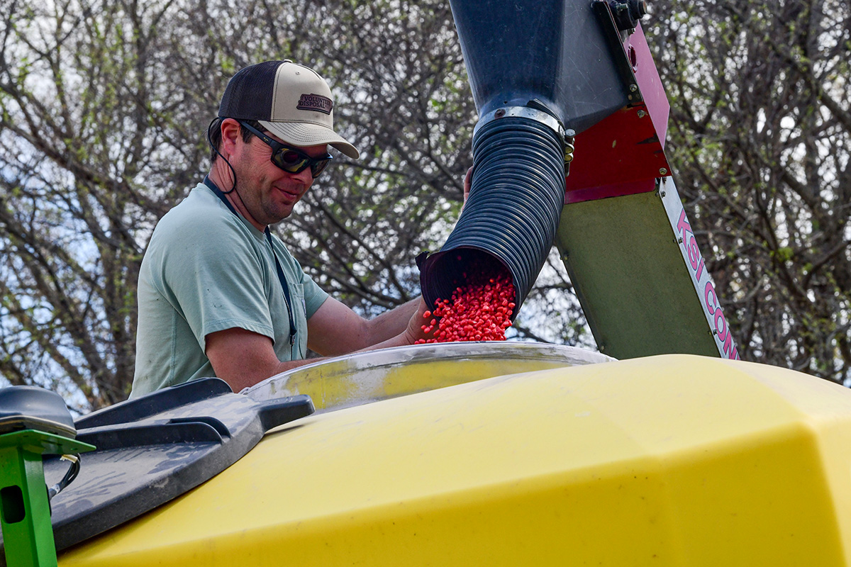 Drew Bailey prepping for fertilizer application for the field