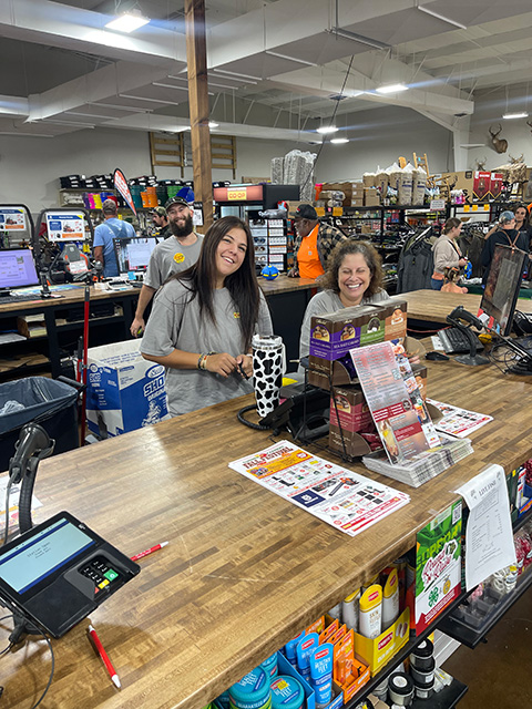 Workers at the front register of the Co-op.